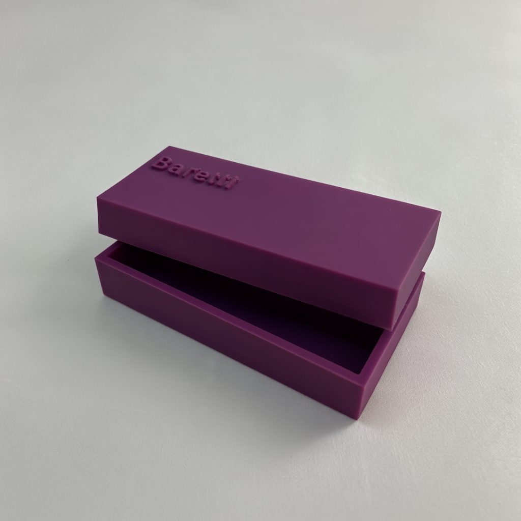 BarCraft purple reusable snack bar maker with sliding compartment open, showing sleek minimal design on neutral background