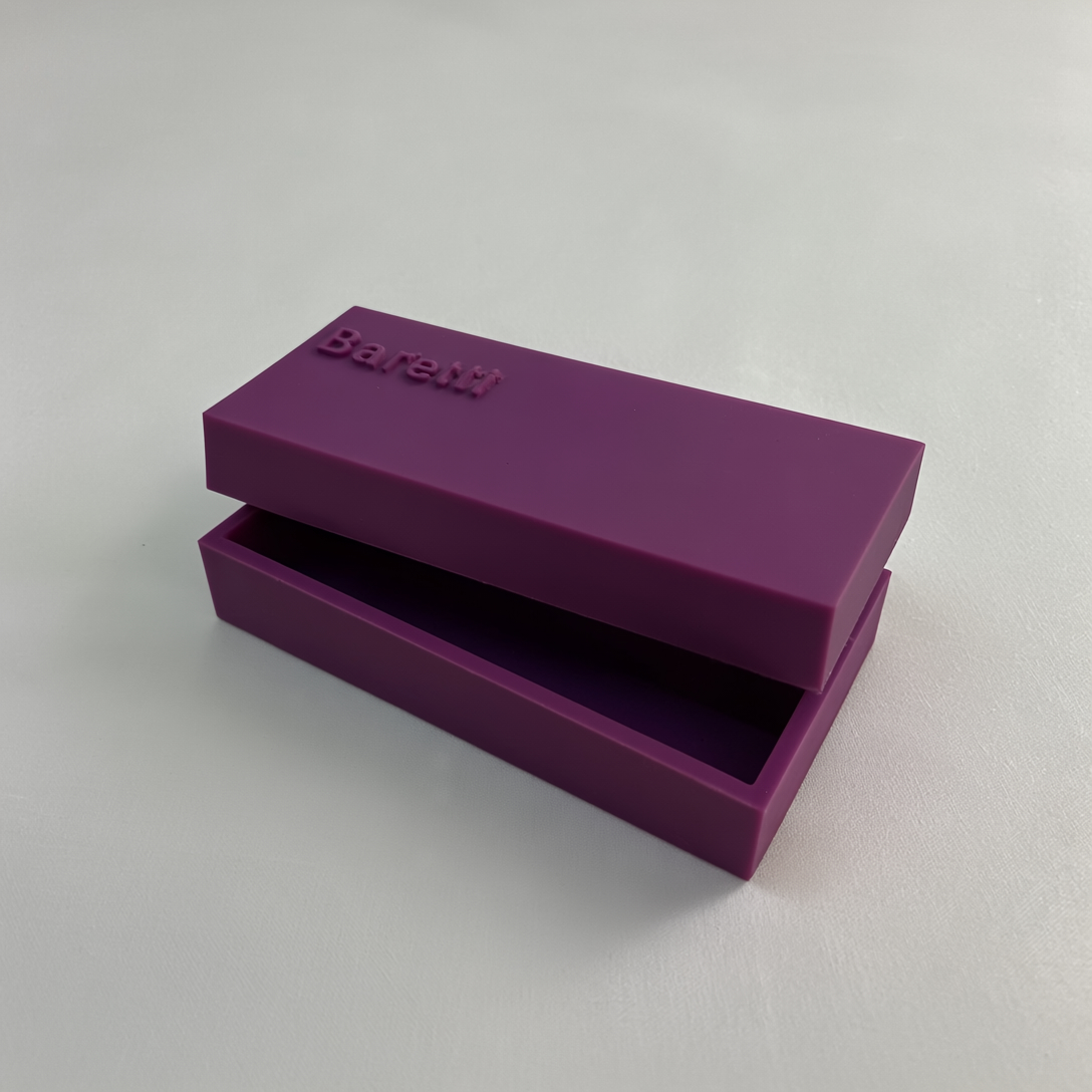 BarCraft purple reusable snack bar maker with sliding compartment open, showing sleek minimal design on neutral background