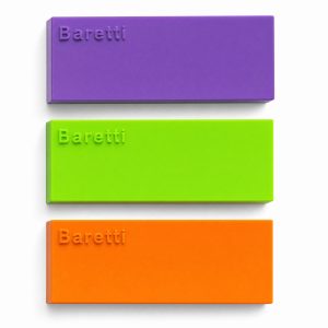 BarCraft reusable snack bar makers stacked in three colors—purple, lime green, and orange—showing closed lids with embossed branding